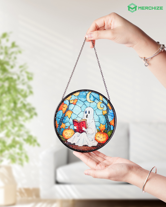 Stained glass suncatcher on hand